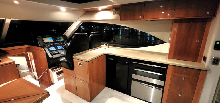 Warm timber, contemporary galley and helm